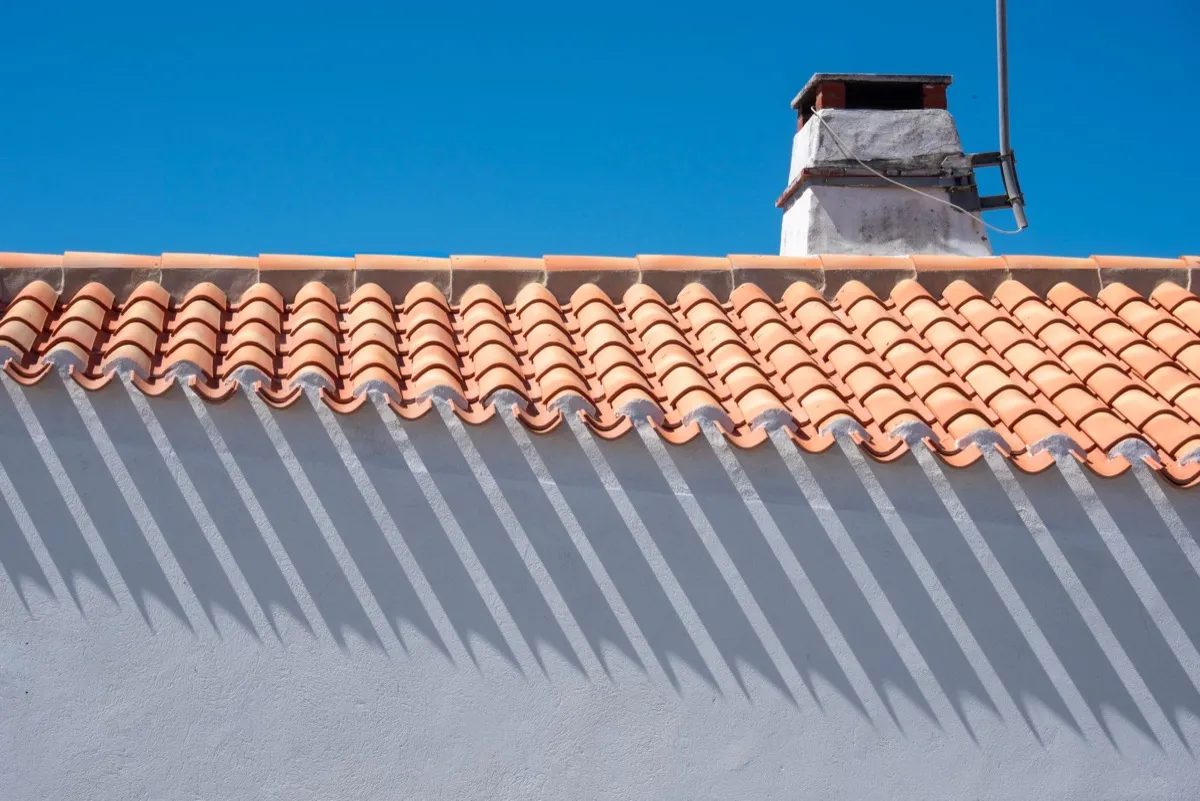 Roof ridge line and chimney on a home in Provo, UT